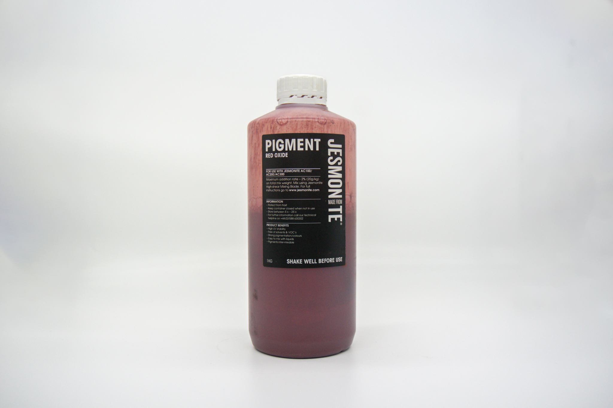 Bottle of Jesmonite red oxide pigment 1kg