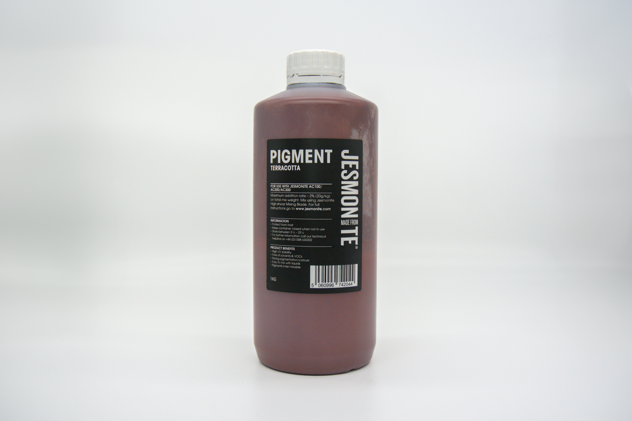 Bottle of Jesmonite terracotta pigment 1kg