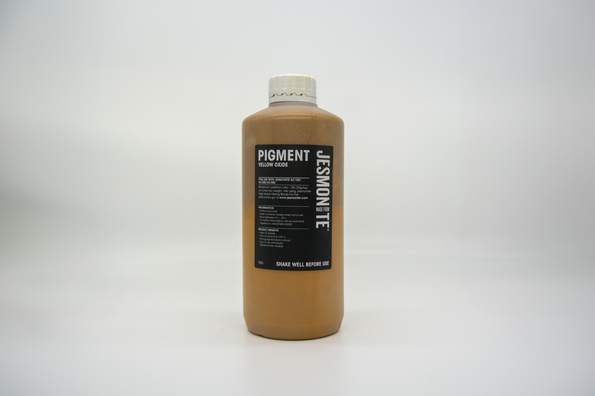 Bottle of Jesmonite yellow oxide pigment 1kg